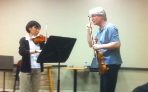 BSO Concertmaster Jonathan Carney coaches a BSO Academy player.